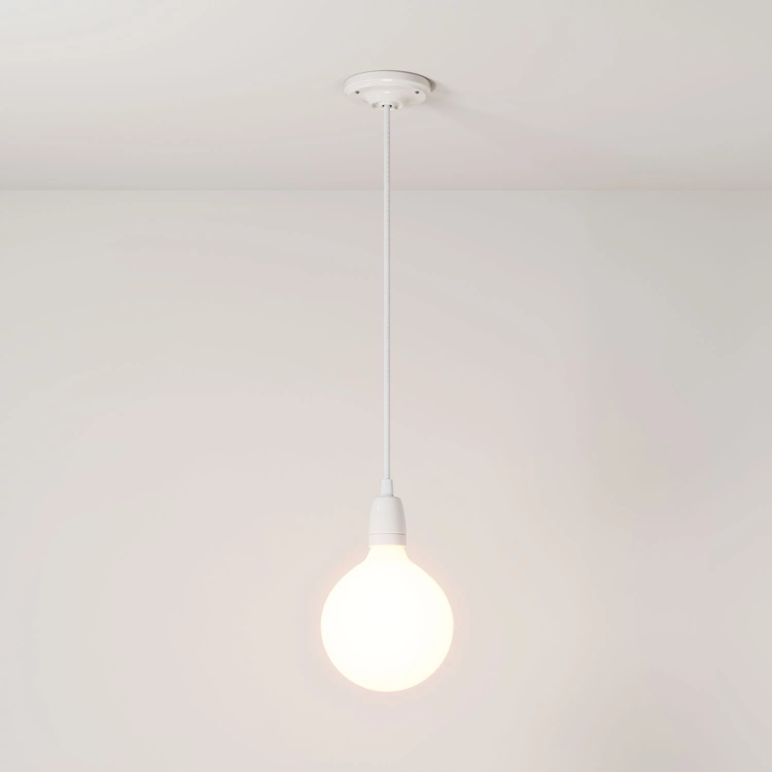Pendant lamp with textile cable and coloured porcelain details - Made in Italy